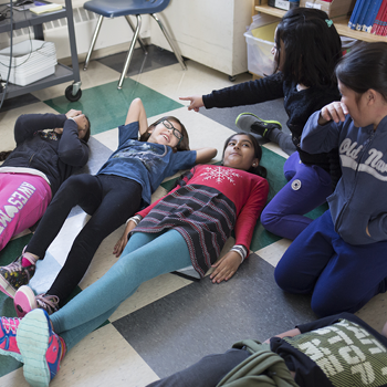 Students play a game of Graveyard after carrying out their assignments during a reading and writing class