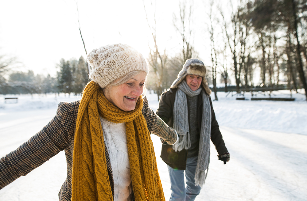 Photo of man and woman outside in winter