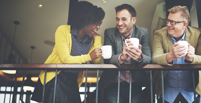 Photo of three friends enjoying coffee