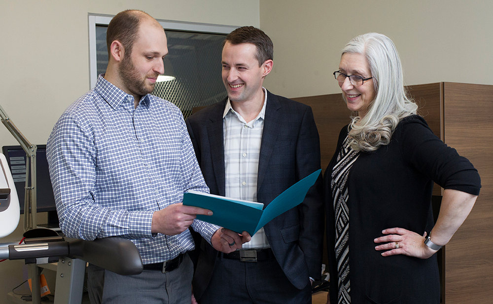 Photo of Dean Cordingley, Dr. Michael Ellis and Karen Reimer