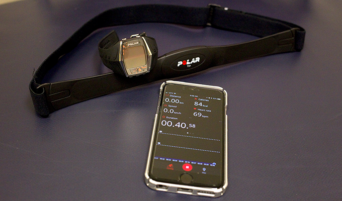 Photo of a wristwatch and a smartphone