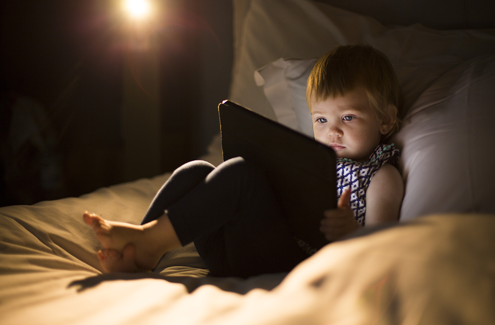 Young child using an iPad